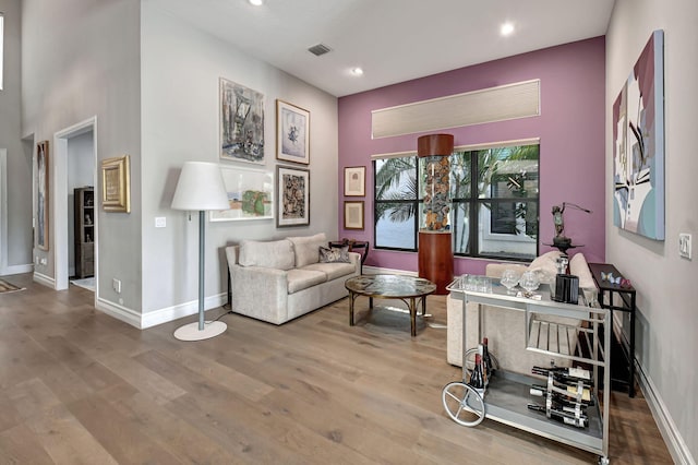 living room with hardwood / wood-style flooring