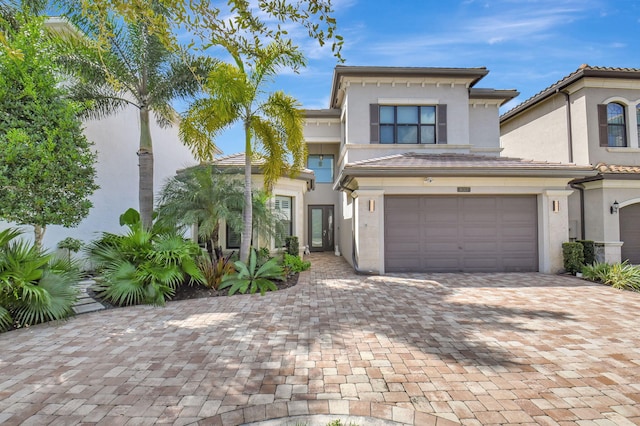 view of front of property featuring a garage