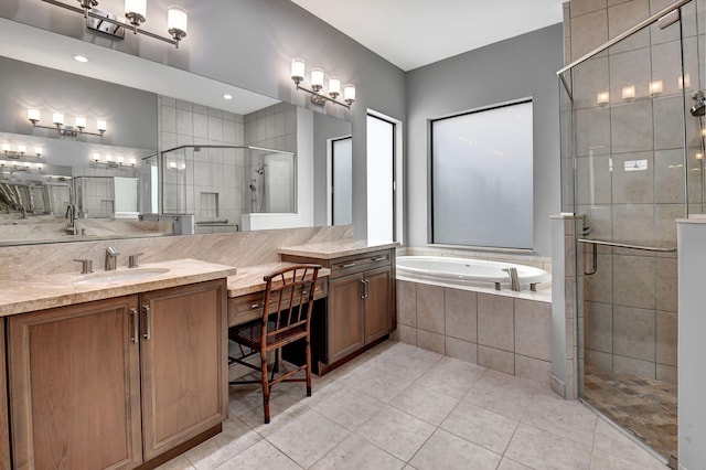 bathroom featuring vanity, independent shower and bath, and tile patterned floors