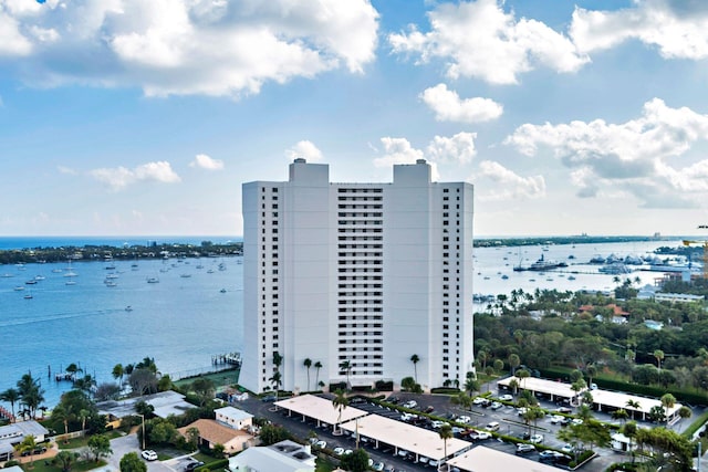 birds eye view of property featuring a water view