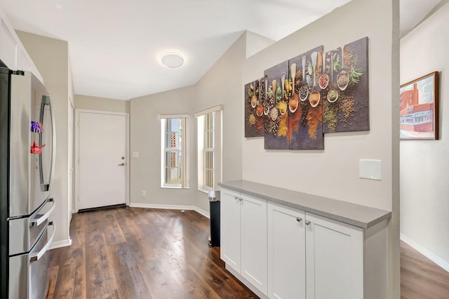 foyer with dark hardwood / wood-style flooring