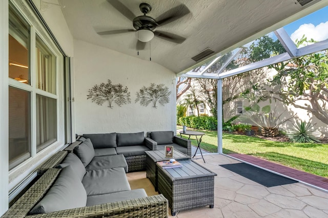 view of patio with ceiling fan and an outdoor living space