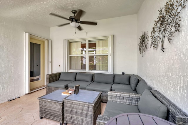 view of patio with an outdoor hangout area and ceiling fan