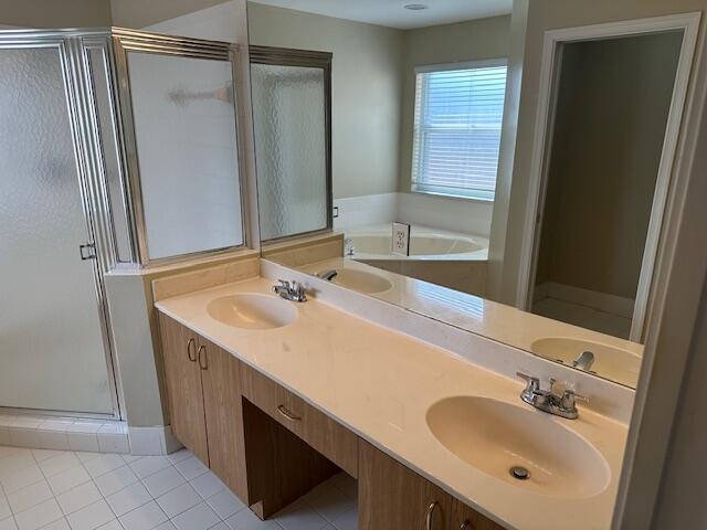 bathroom with vanity, separate shower and tub, and tile patterned floors