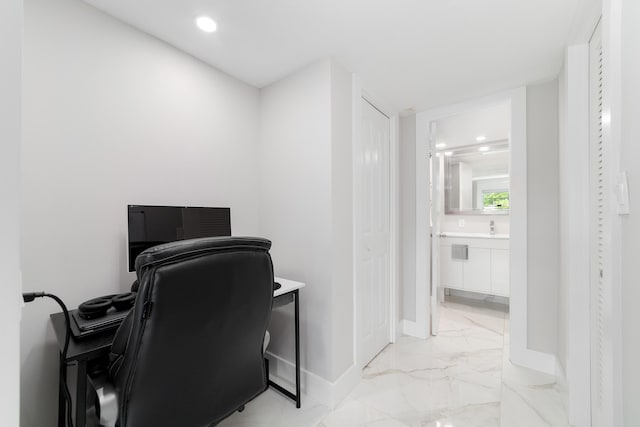 2801 N Palm Aire Dr Unit 106, Pompano Beach, FL 33069 - office area featuring baseboards, marble finish floor, and recessed lighting