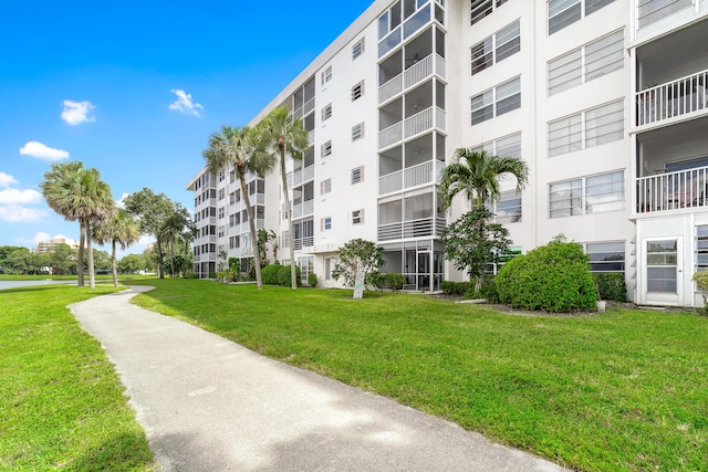 2801 N Palm Aire Dr Unit 106, Pompano Beach, FL 33069 - view of home's community with a yard