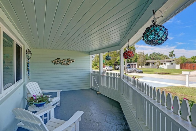 view of patio featuring covered porch