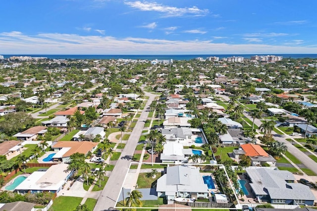 drone / aerial view with a water view