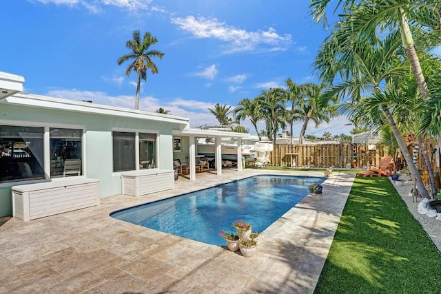 view of swimming pool featuring a patio