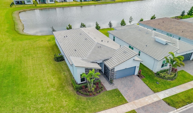 drone / aerial view with a water view