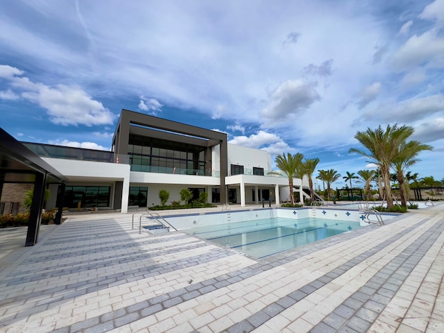 view of pool featuring a patio area