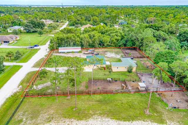 birds eye view of property featuring a rural view