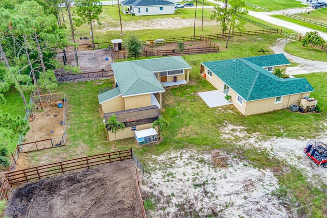 birds eye view of property featuring a rural view