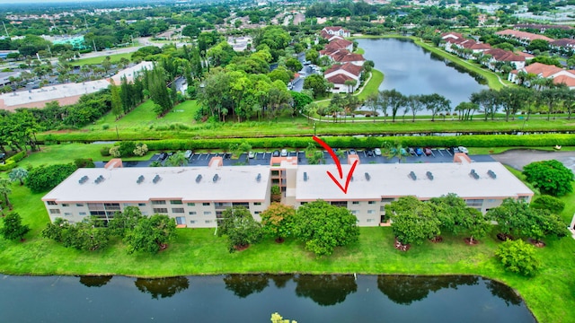 birds eye view of property featuring a water view