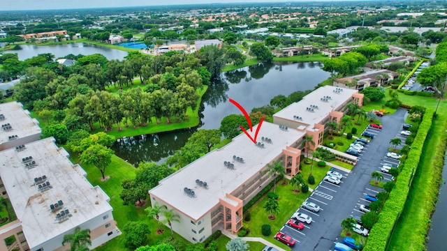 birds eye view of property featuring a water view