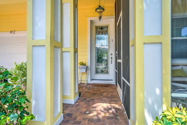 property entrance featuring covered porch