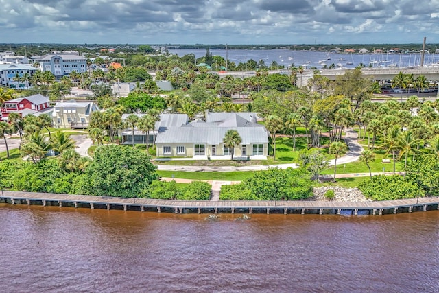 birds eye view of property featuring a water view