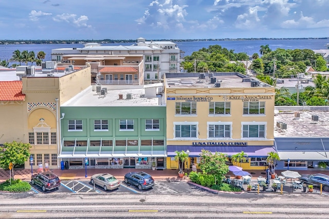 view of building exterior with a water view