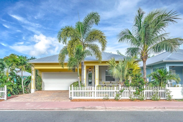 view of front of property featuring a garage