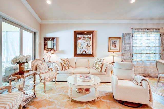 living room with hardwood / wood-style floors and crown molding