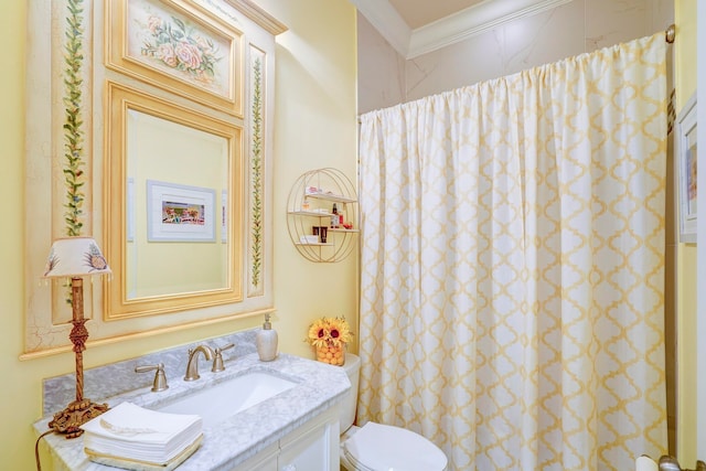 bathroom with vanity, crown molding, walk in shower, and toilet