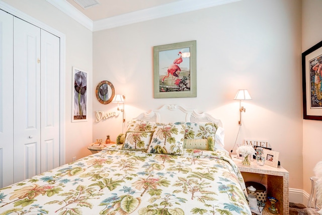 bedroom featuring a closet and ornamental molding