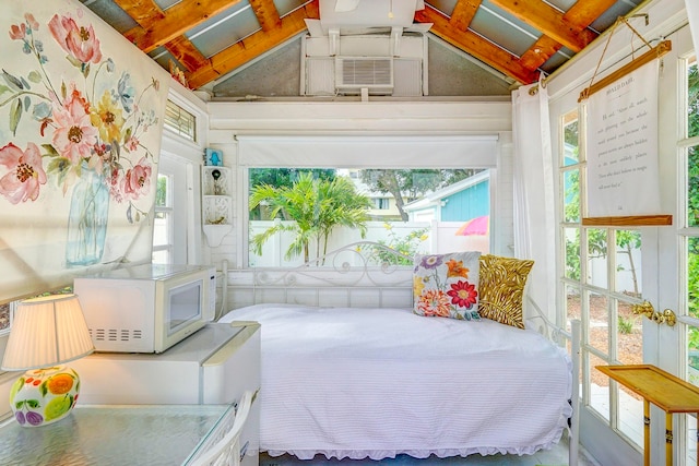 bedroom with lofted ceiling with beams