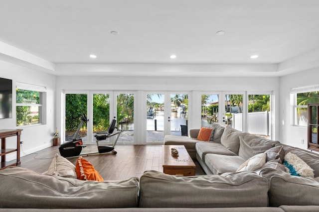 living room with french doors and wood-type flooring