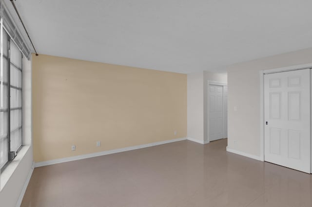 view of tiled spare room