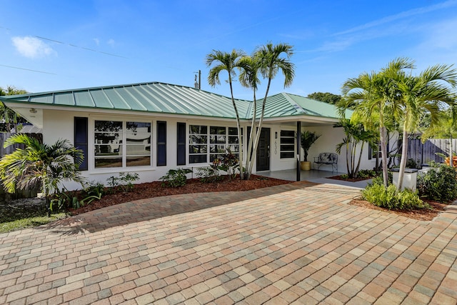 view of front of home with a patio