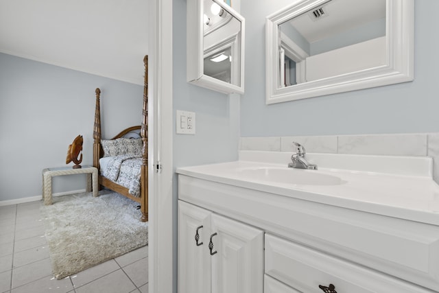 bathroom with vanity and tile patterned flooring