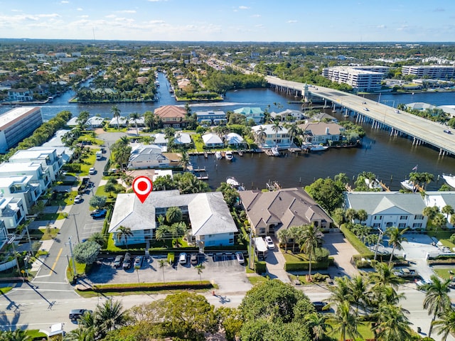 birds eye view of property featuring a water view