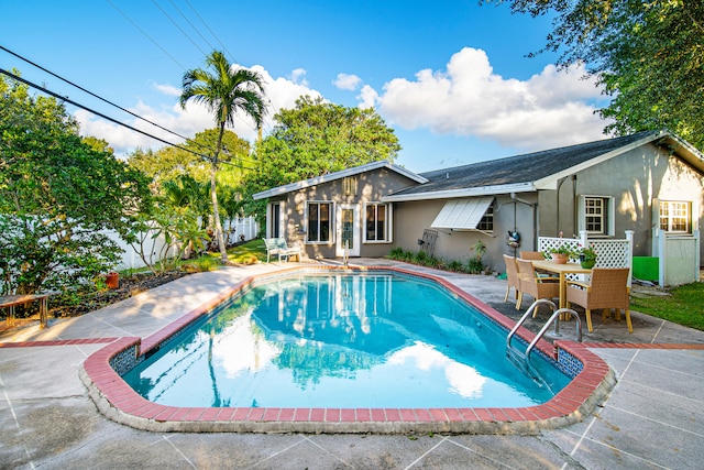 view of pool with a patio