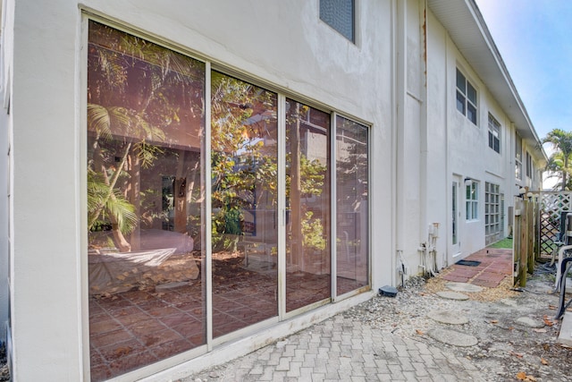 view of property exterior featuring a patio area