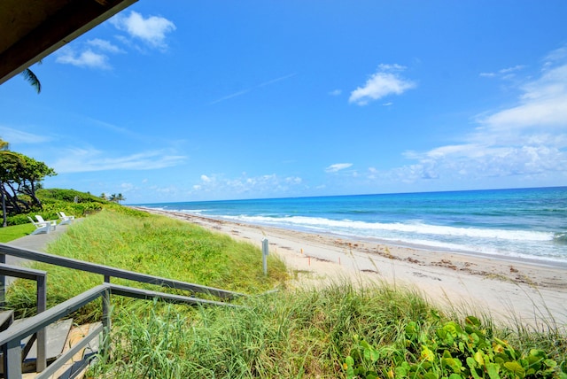 view of water feature with a beach view