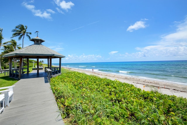 view of water feature with a gazebo and a view of the beach