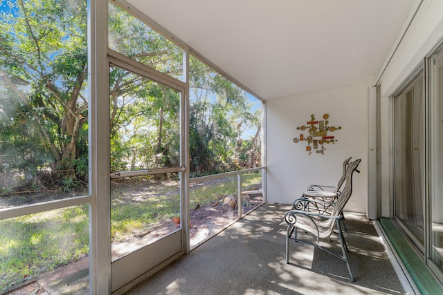 unfurnished sunroom featuring plenty of natural light