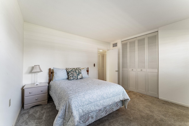 carpeted bedroom with a closet