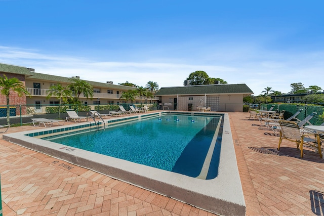 view of pool featuring a patio area