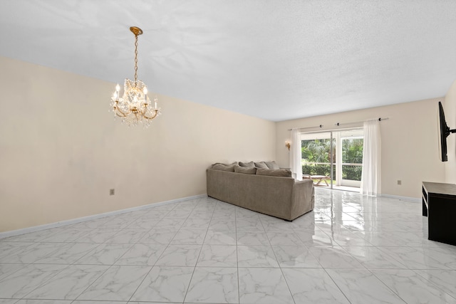 unfurnished living room with a chandelier