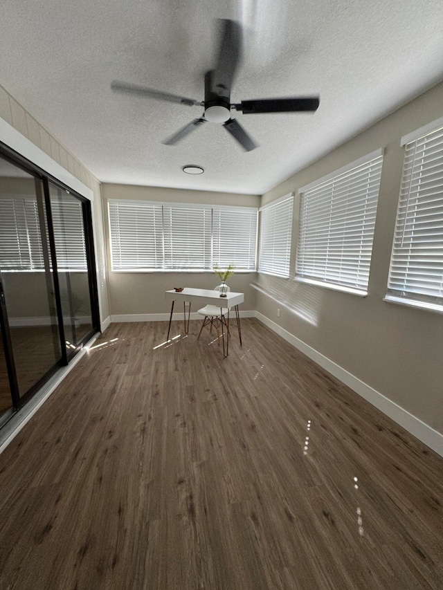 interior space featuring ceiling fan