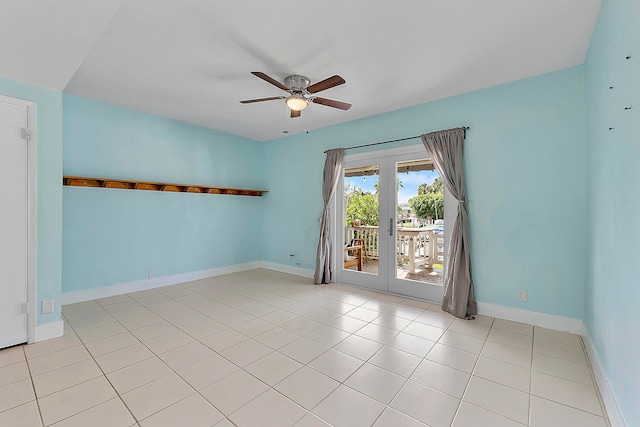 tiled spare room with french doors and ceiling fan