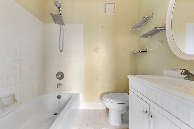 full bathroom featuring vanity, toilet, tile patterned floors, and tiled shower / bath