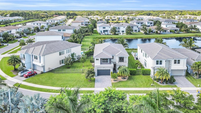 drone / aerial view with a water view