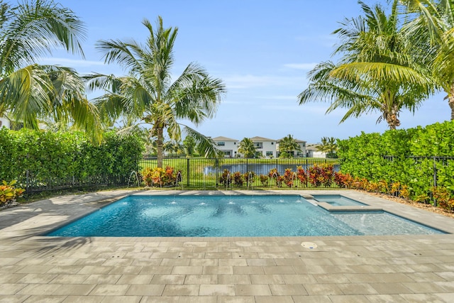 view of pool featuring an in ground hot tub