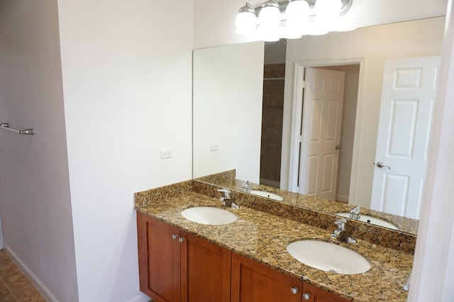 bathroom with vanity and tile patterned floors