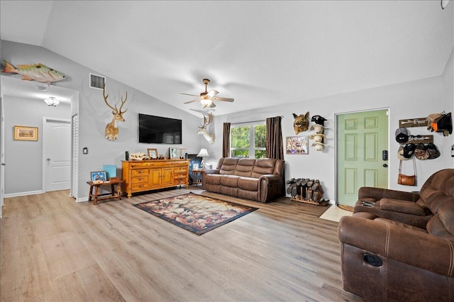 living room with light hardwood / wood-style floors, lofted ceiling, and ceiling fan