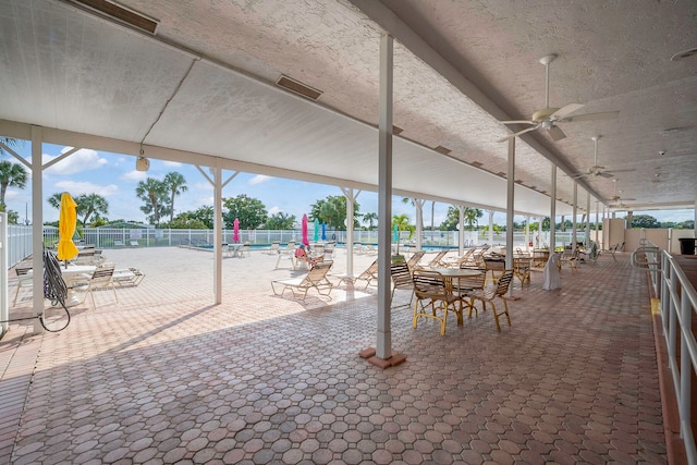 view of patio / terrace featuring ceiling fan