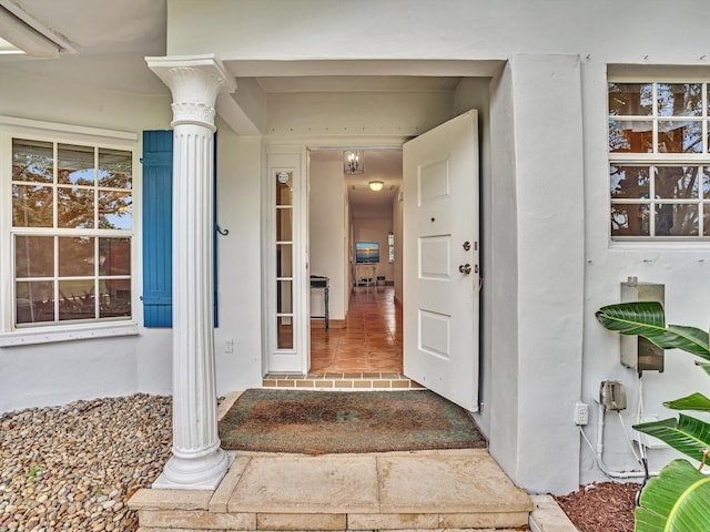 doorway to property featuring covered porch