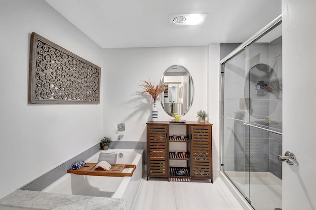 bathroom with vanity and plus walk in shower